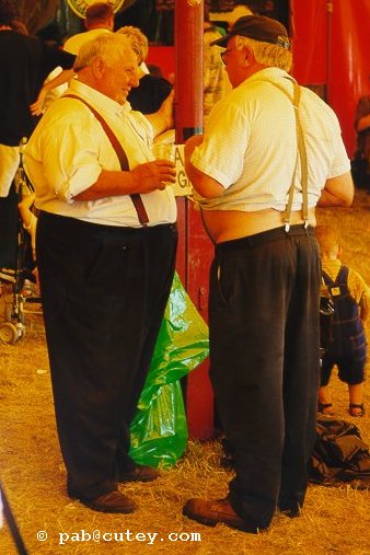 Two buddies enjoy a pint in the beer tent...